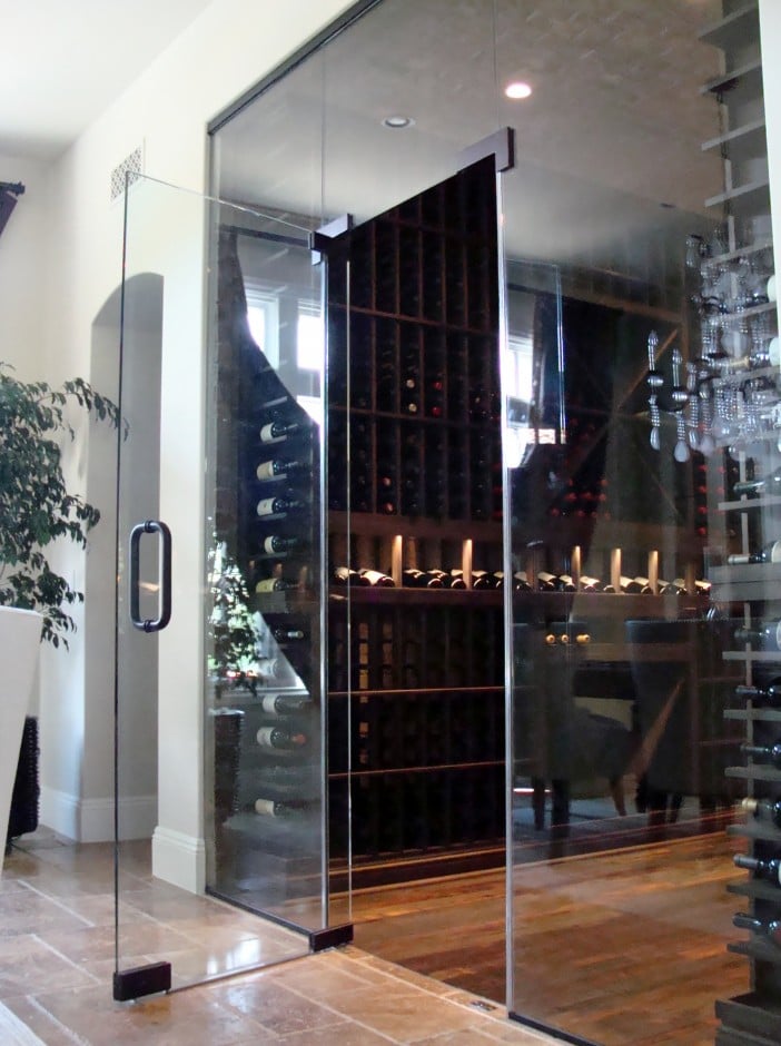 Seamless Glass Wine Cellar Door by San Diego Master Builders