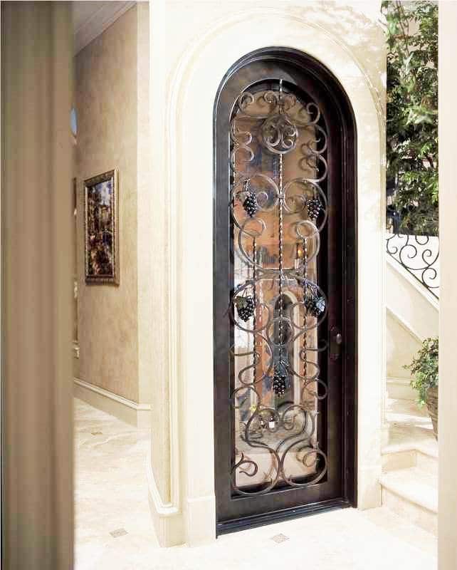 Check out more styles of wine cellar doors. Wrought Iron and Glass Custom Wine Cellar Door San Diego