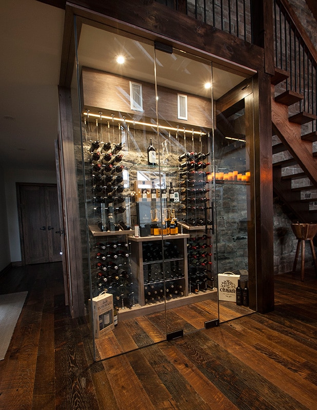 wine cellar with Cable Wine Systems under the stairs