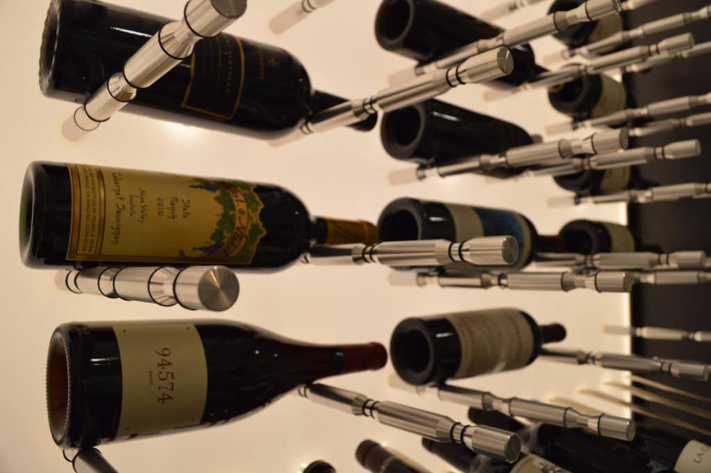 Interested with metal wine racks? Click now to find out why you should have one in your wine cellar. Modern wine cellar with metal wine pegs
