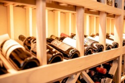 12 - Modern touches aren't only limited to metal, glass, and concrete. You can also see it in the technology used inside a modern wine room — like this high-reveal row and LED lighting combination! Modern touches aren't only limited to metal, glass, and concrete. You can also see it in the technology used inside a modern wine room — like this high-reveal row and LED lighting combination!